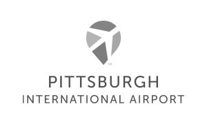 Logo of Pittsburgh International Airport featuring a stylized pin and airplane graphic above the text.