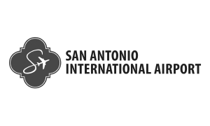 San Antonio International Airport logo featuring a stylized SA with an airplane silhouette inside a quatrefoil shape.