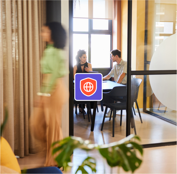 A group of people sitting at a table.