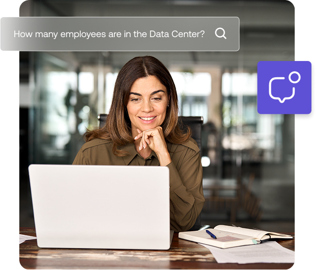 A person using a laptop at a desk appears to be searching about the number of employees in a data center.