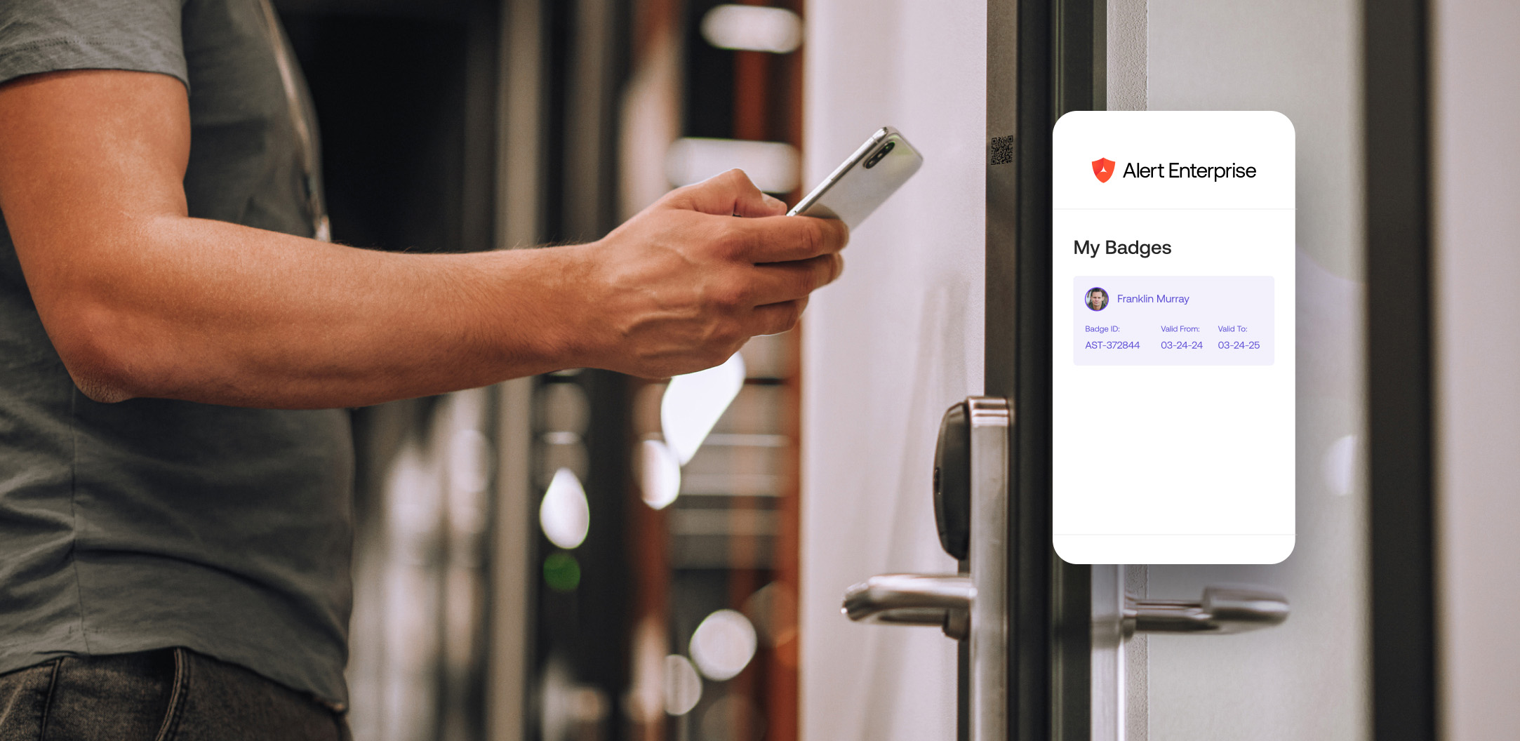 A person holds a smartphone near a door lock, using a digital badge app called Alert Enterprise to access the door.
